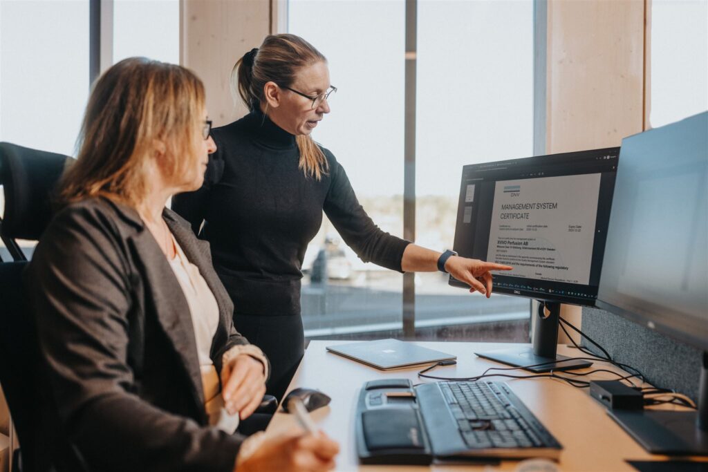 Engaged employees talking about work.
